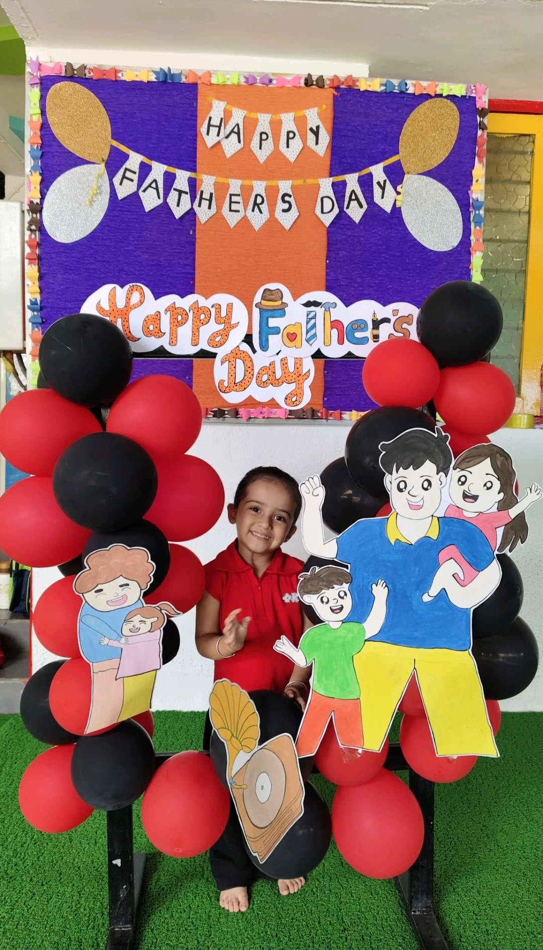 A child enjoying the Father's Day celebration at TreeHouse Nikol